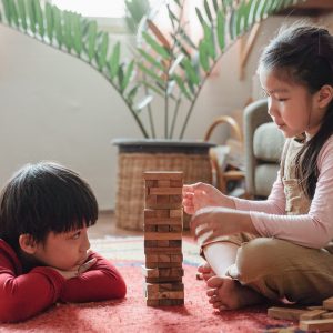 Kids playing with wooden games